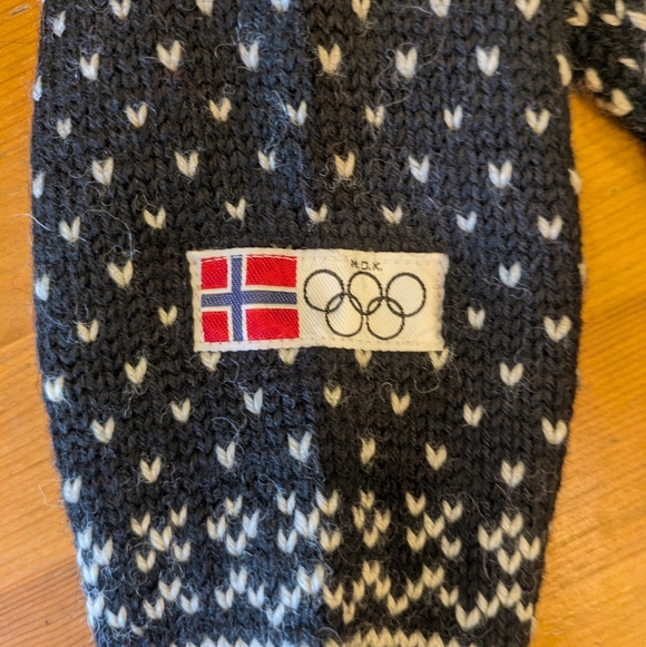 Dale of Norway Black and White Sweater with Red and Green Accents - Picture 4 of 6